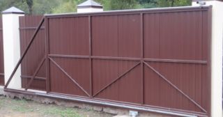 Купить откатные ворота из профнастила Реж, цена от 1747 руб.